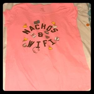 A pink Justice shirt